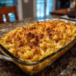 A close-up of a glass baking dish filled with delicious Baked Mac and Cheese with Crispy Topping.