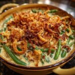 A close-up of a creamy Green Bean Casserole with Crispy Onions topping.