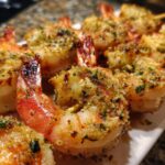 Close-up of delicious Parmesan Garlic Shrimp Skewers, coated in breadcrumbs and herbs, ready to be served.
