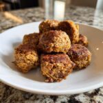 Close-up of a white bowl filled with homemade Beef & Cheddar Training Treats.