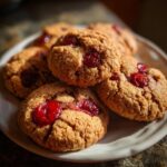 Close-up of a plate of homemade Maraschino Cherry Cookies.