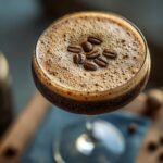 Close-up of an Irish Whiskey Espresso Martini garnished with coffee beans.