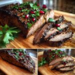 Sliced Lemony Flank Steak with Pomegranate Molasses, garnished with pomegranate seeds and herbs, on a wooden board.