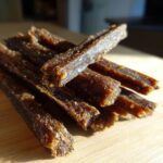Close-up of homemade Beef and Quinoa Protein Dog Chews, a healthy treat for dogs.