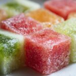 Close-up of colorful Cucumber Watermelon Frozen Dog Slush Cubes, a refreshing treat for dogs.
